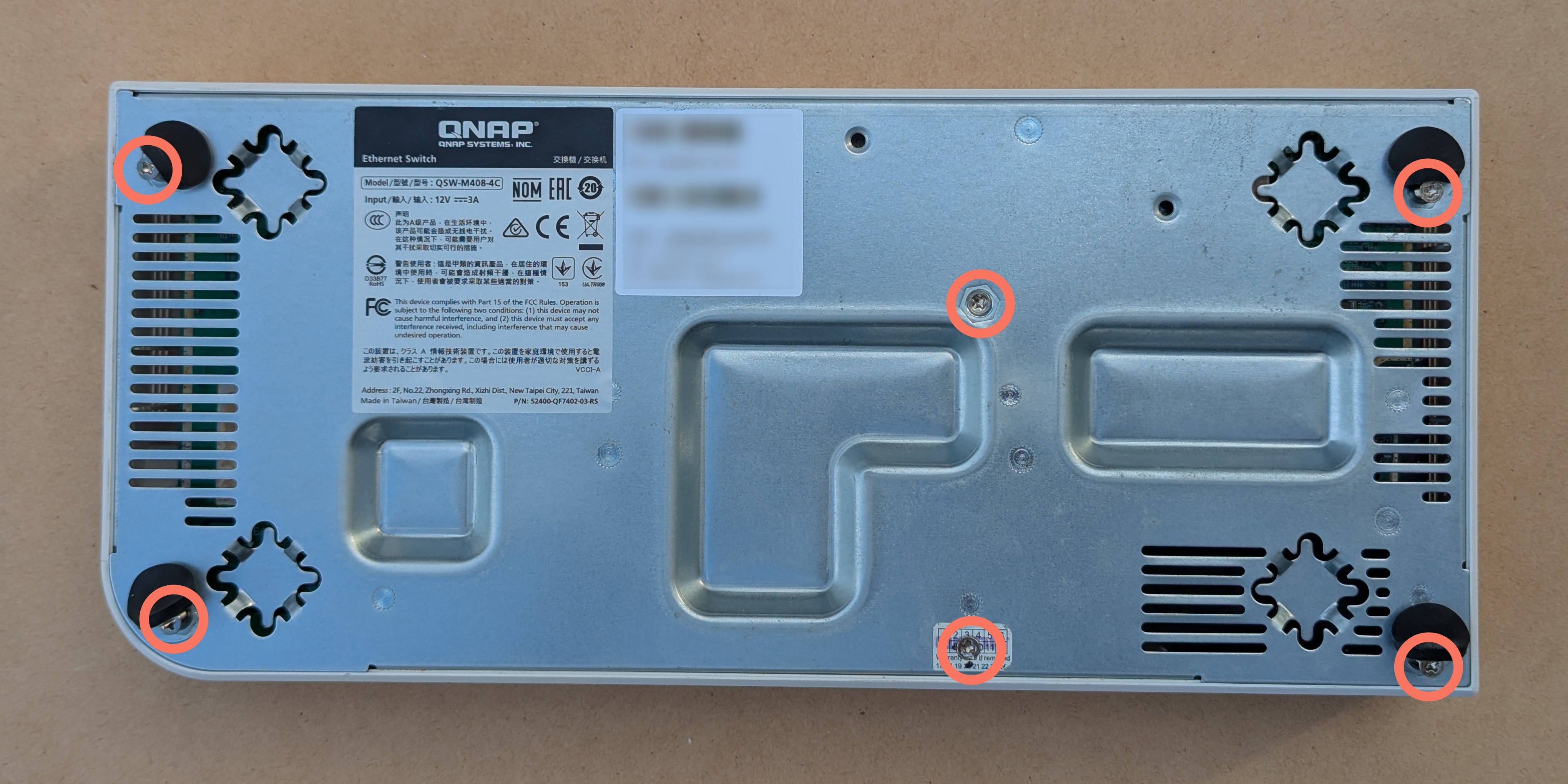 Underside with screws highlighted